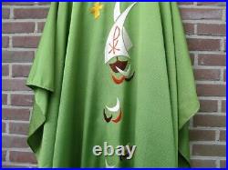 Green Catholic liturgical chasuble vestment with embroidered ships on the waves