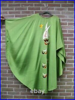 Green Catholic liturgical chasuble vestment with embroidered ships on the waves