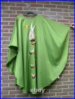 Green Catholic liturgical chasuble vestment with embroidered ships on the waves