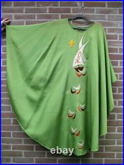 Green Catholic liturgical chasuble vestment with embroidered ships on the waves